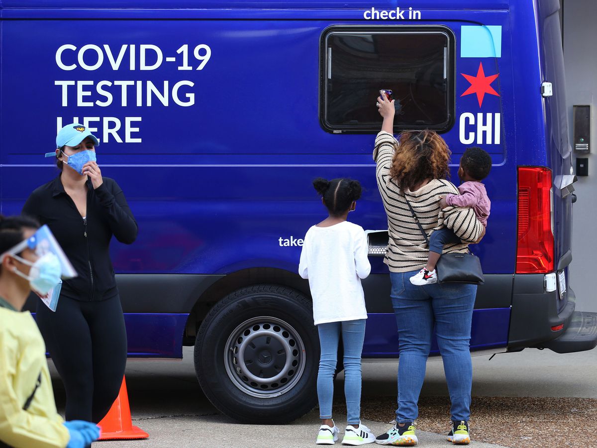 Daily record of 12,623 newly confirmed and probable COVID-19
cases in Illinois sends total case count past 500,000 1 Daily record of 12,623 newly confirmed and probable COVID-19
cases in Illinois sends total case count past 500,000 1