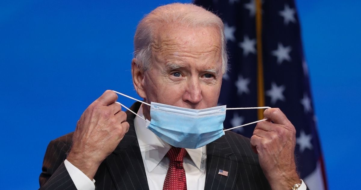 Video Catches the Sick Moment Biden Coughs Right Into His
Hand After Taking Mask Off 1