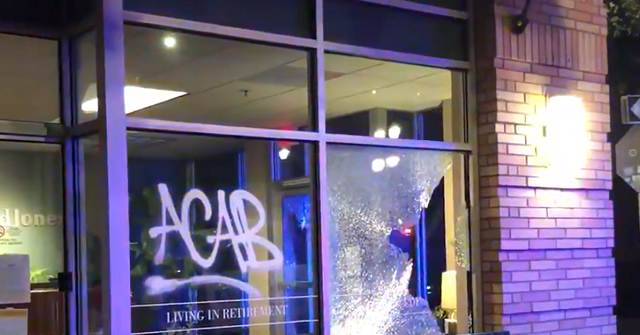 Police Declare Riot as Antifa Attacks Businesses in
Portland 1