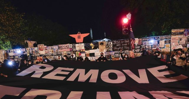 Left-wing Protesters Near White House Unfurl 'Remove Trump'
Banner on Election Night 1