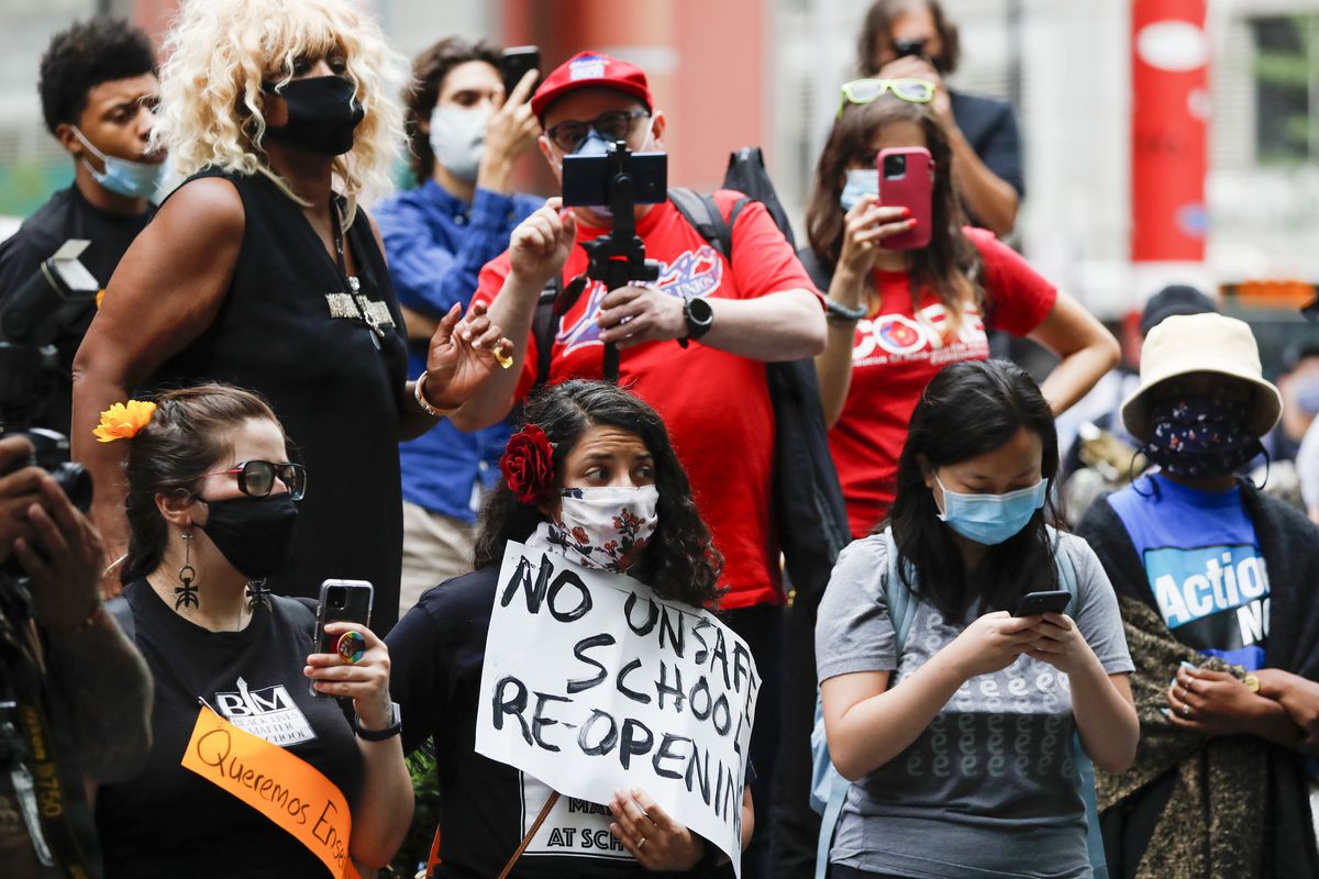Arbitrator rules against Chicago Public Schools in labor
dispute over clerks, but district will still require them to work
mostly in person, saying COVID-19 measures in place 1 Arbitrator rules against Chicago Public Schools in labor
dispute over clerks, but district will still require them to work
mostly in person, saying COVID-19 measures in place 1