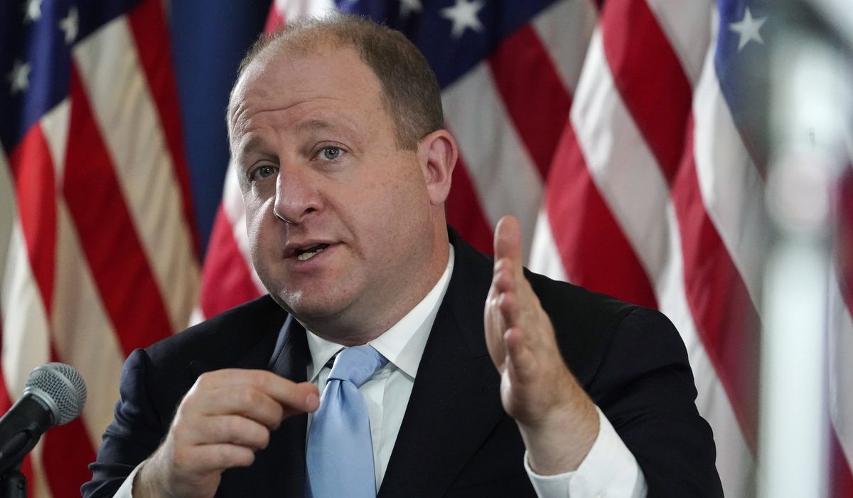 Colorado governor quarantining after COVID-19
exposure 1