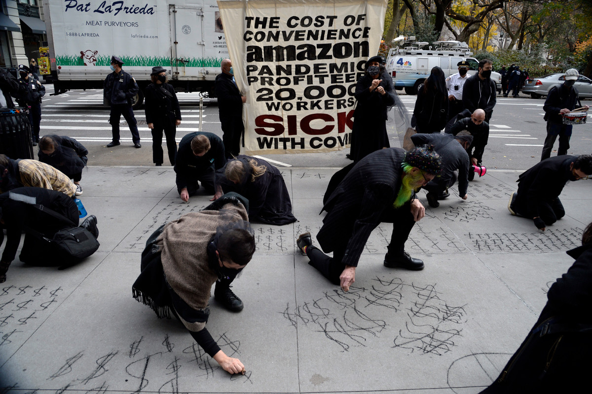Human Rights groups protest Amazon over worker pay ahead of
Cyber Monday 1