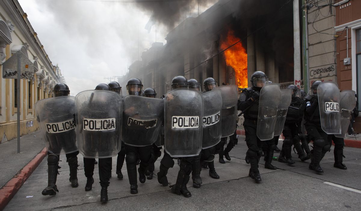Guatemalan Congress backs down on budget after
protests 1