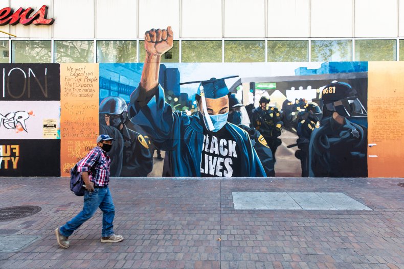 Gun Dealer Sparks Backlash After Inviting Right-Wing Groups
to Protest Black Lives Matter Art Installation 1
