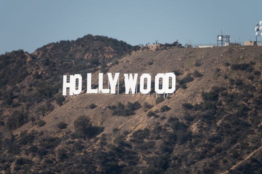 In California: L.A. County adopts further COVID-19
restrictions, and Disney lays off workers 1