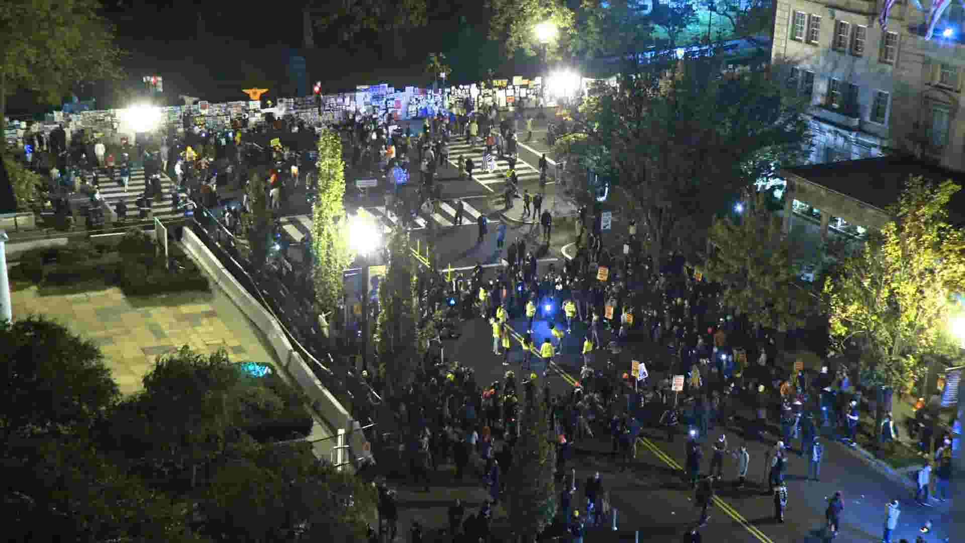 Protest banners unfurled at DC's BLM Plaza 1