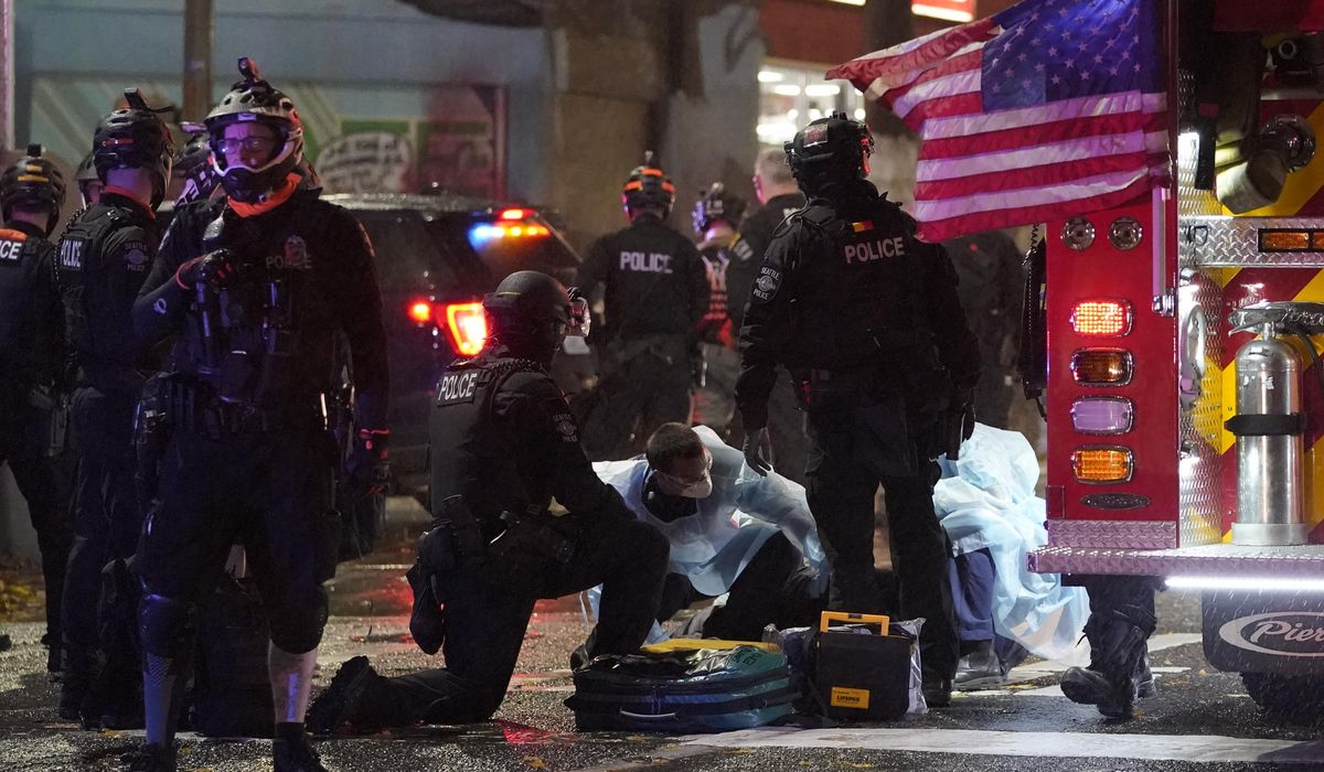Investigation launched into protester who was
hospitalized 1