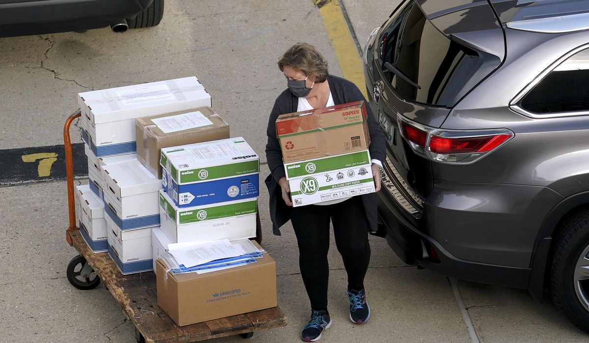 Wisconsin recount: Masks, plexiglas and lots of
ballots 1