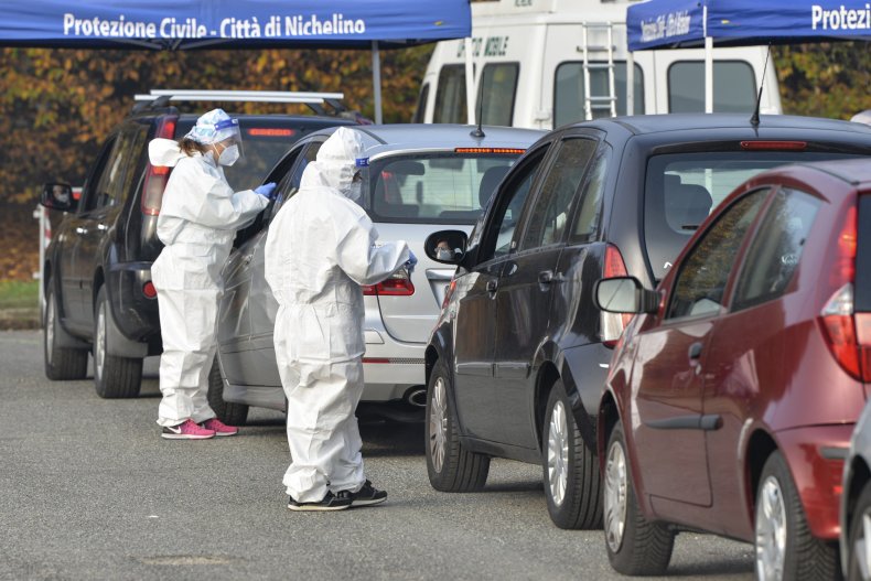 COVID-19 Patients Receive Oxygen in Cars in Italy as
Hospitals Overwhelmed 1