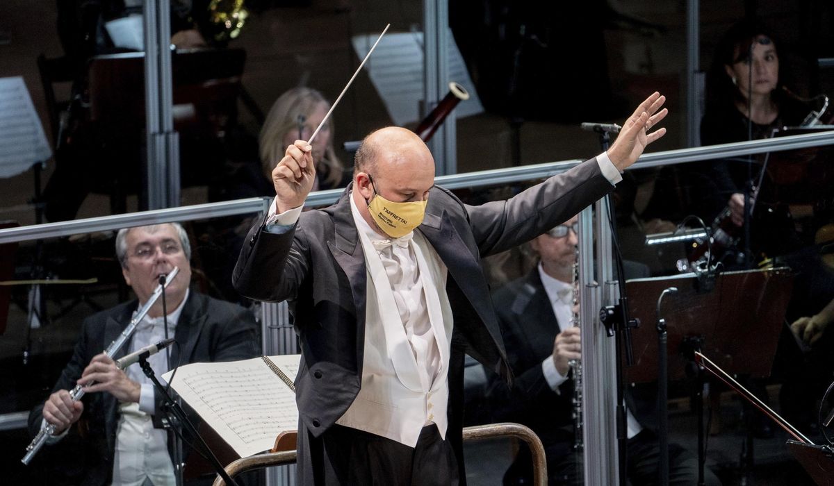 In Italy, theater reopens in town devastated by
COVID 1