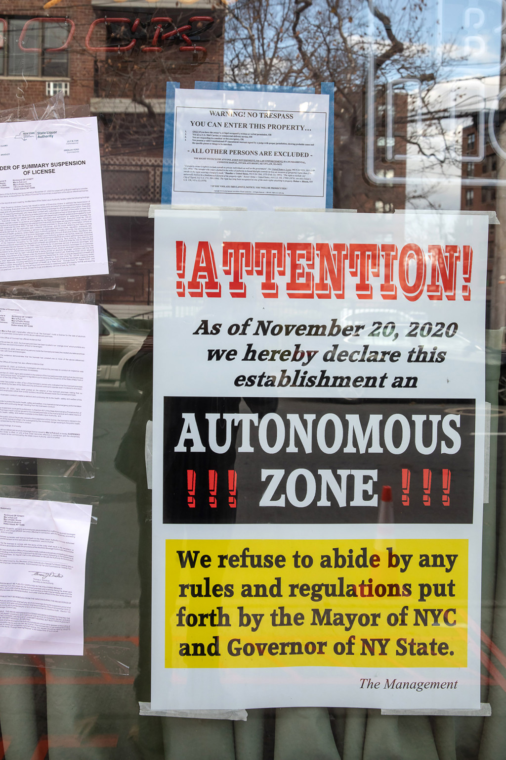 NYC bar in COVID-19 hotspot refuses to shut down after state
yanks liquor license 1