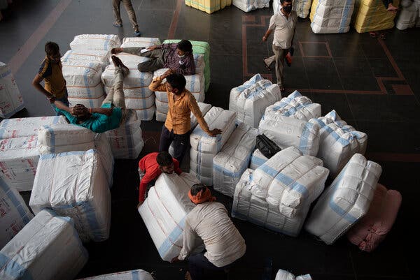 India’s Economy Shrinks Sharply as Covid-19 Slams Small
Businesses 1
