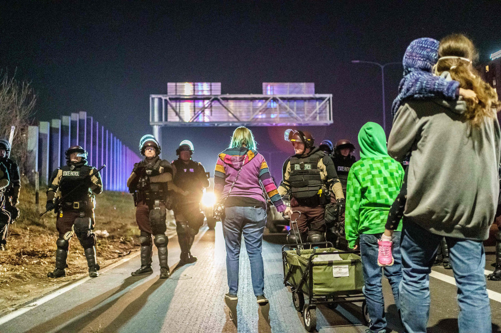 Minneapolis protesters start dance party while waiting to be
arrested 1