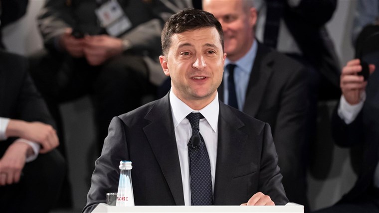 Pandemic, protests and conflict: Ukraine sours on
comedian-turned-president 1