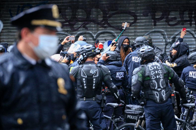 BLM Supporter Yells Racial Slurs at Black NYPD
Officers 1