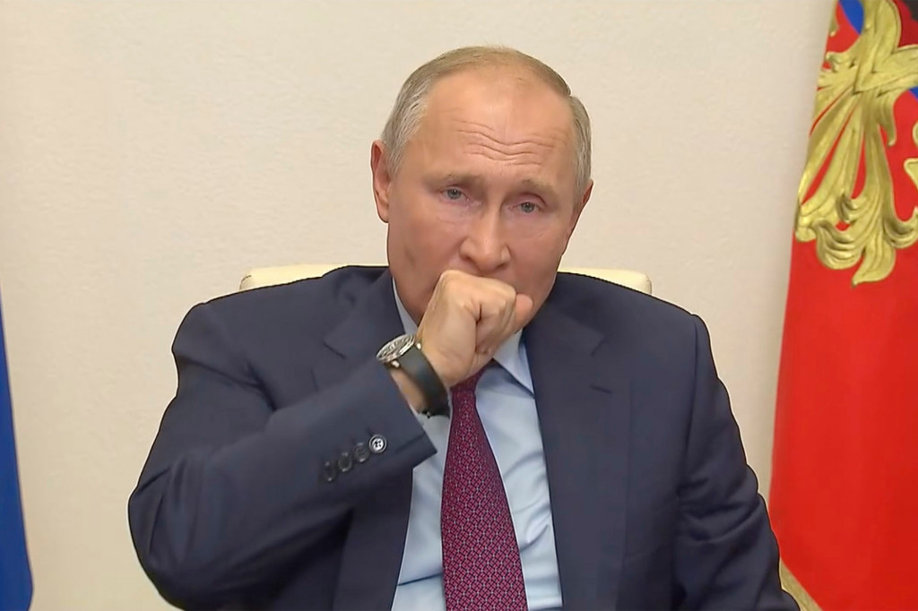 Kremlin says Vladimir Putin is ‘fine’ after coughing fit at
COVID-19 meeting 1