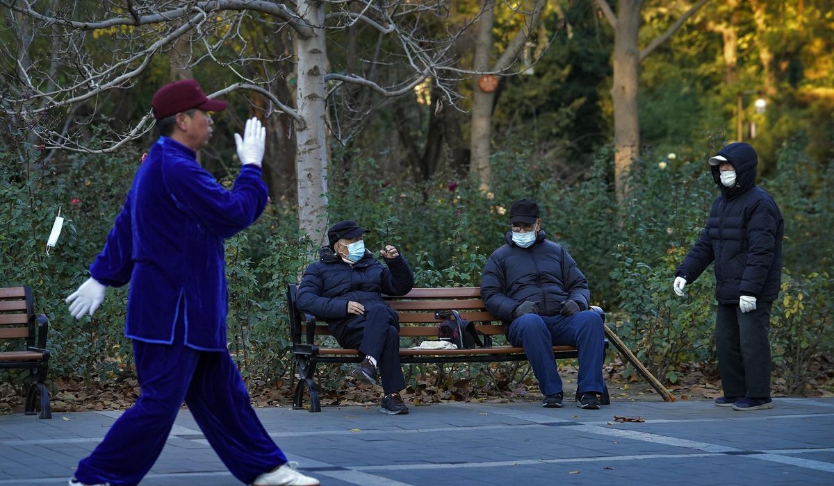 China tests millions after coronavirus flare-ups in 3
cities 1