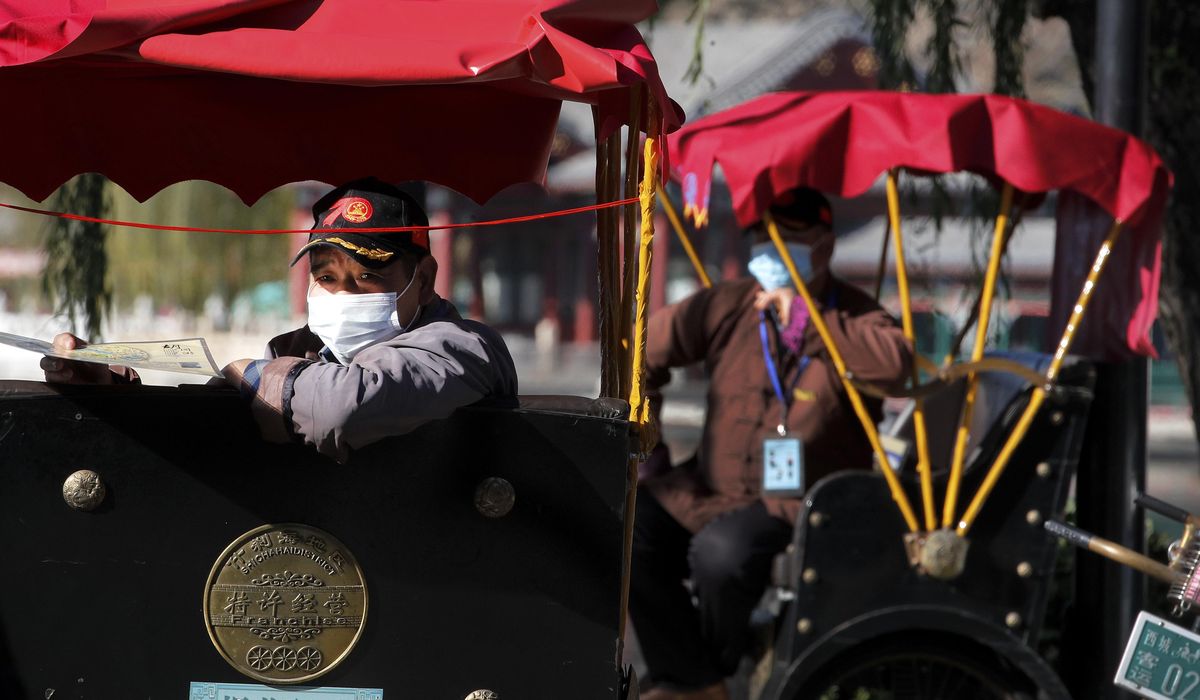 The Latest: New Delhi sees sharp surge in coronavirus
cases 1