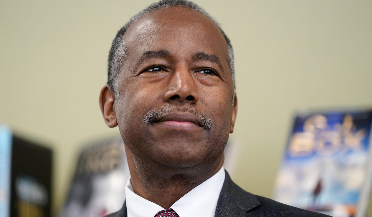 Carson says he's 'out of the woods' after battling
COVID-19 1