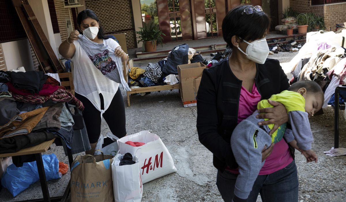 In Spain, coronavirus puts the poor at the back of the
line 1