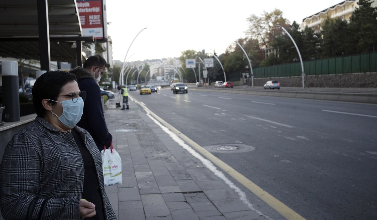 The Latest: Turkey bans public smoking to reinforce mask
use 1