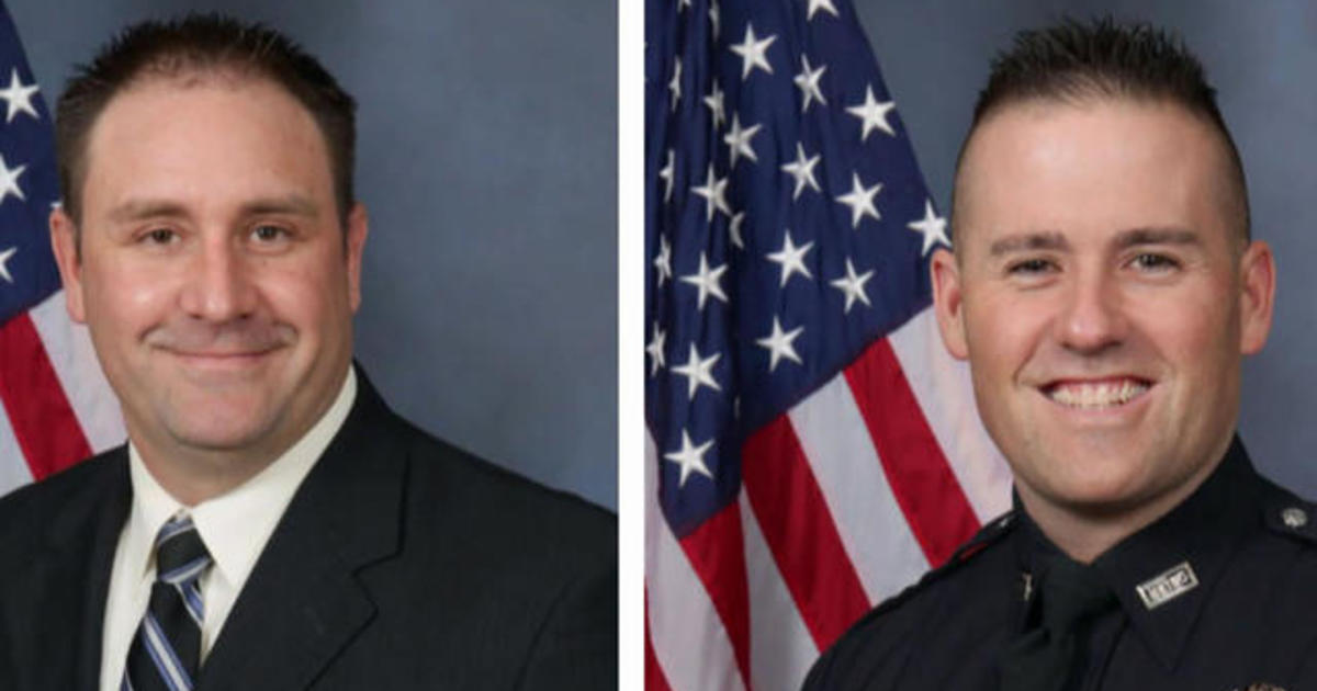 Louisville police department moves to fire two officers
involved in the death of Breonna Taylor 1