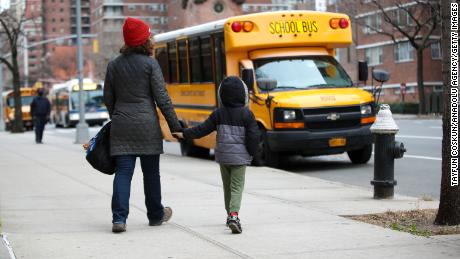 New York City elementary students are back in schools. But
older students will have to wait 1
