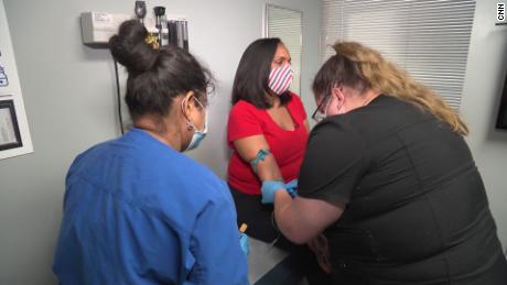Nearly one third of Black Americans remain hesitant to get
Covid-19 vaccine, study finds 1