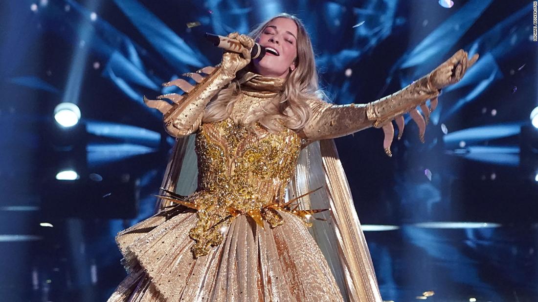 LeAnn Rimes wins 'The Masked Singer' Season 4 as The
Sun 1