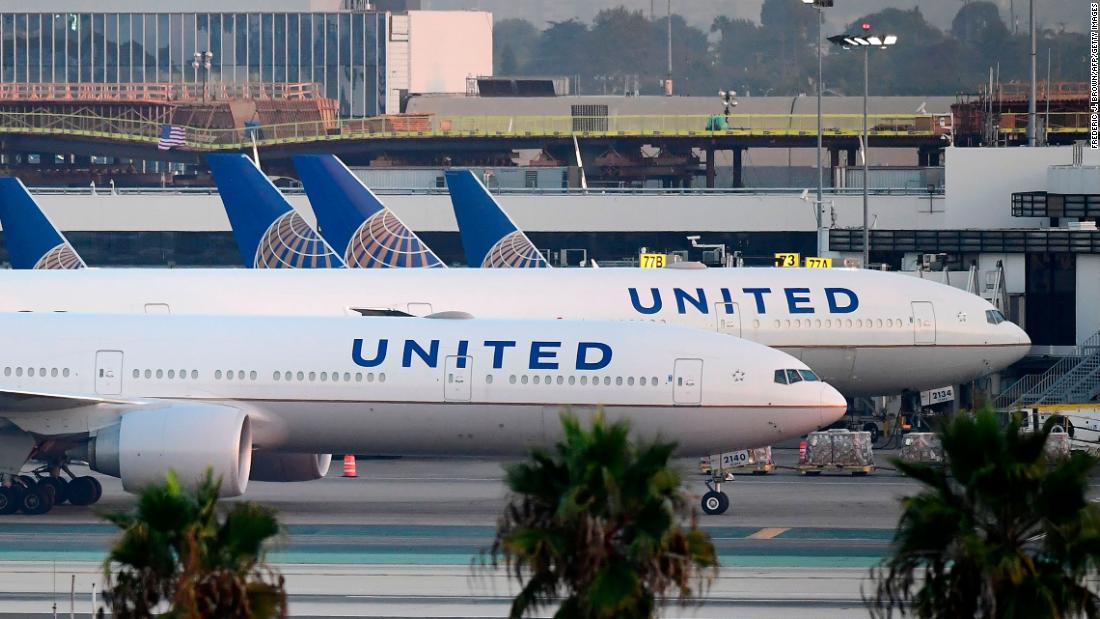 United passenger who died may have had Covid-19 symptoms,
airline says 1