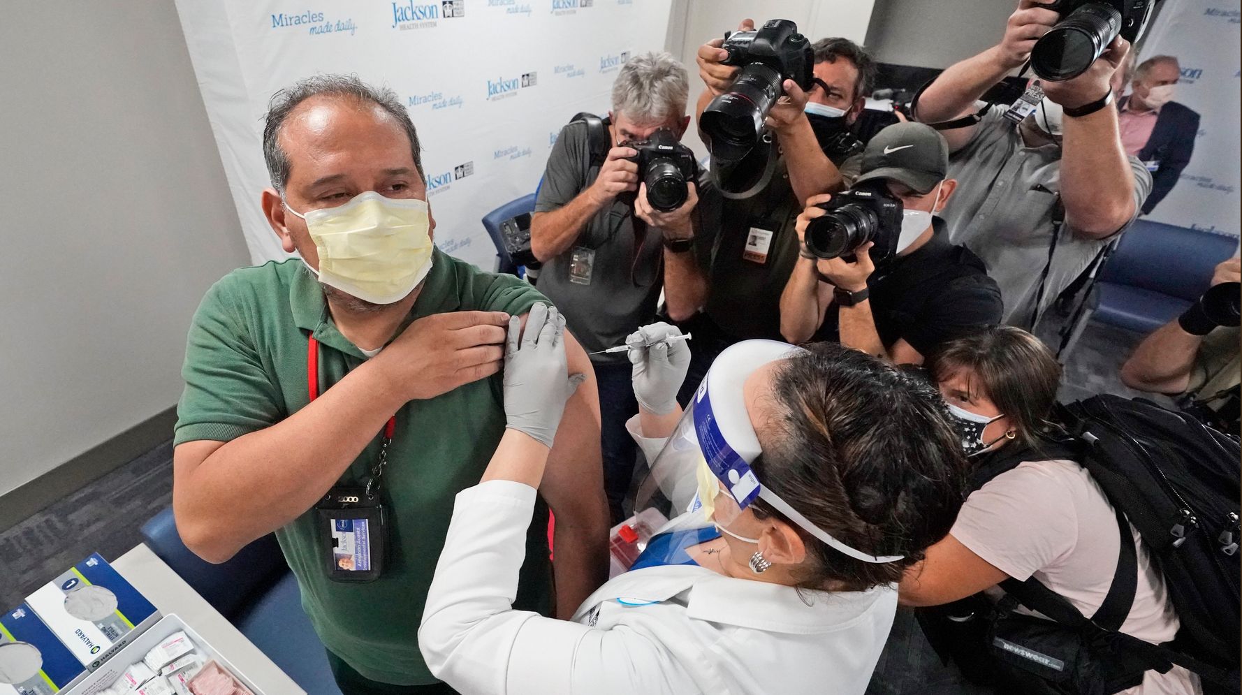 COVID-19 Immunization Rollout Expands As Cities Work To Ease
Skepticism 1