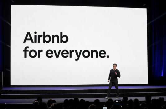 Airbnb shares open at $146 in long-awaited IPO 1
