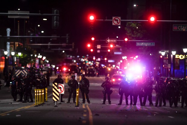 Denver police chief promises change after scathing report on
George Floyd protest response 1
