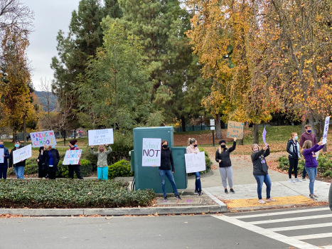 East Bay parents rally for district to reopen
schools 1
