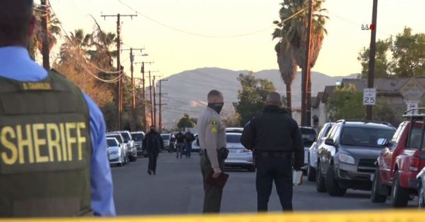 Murder suspect killed, officer injured in California police
shooting 1