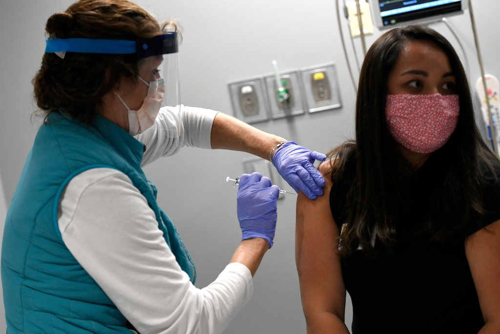 First COVID-19 vaccines to arrive in Colorado within days,
but picture beyond initial shipments is cloudy 1