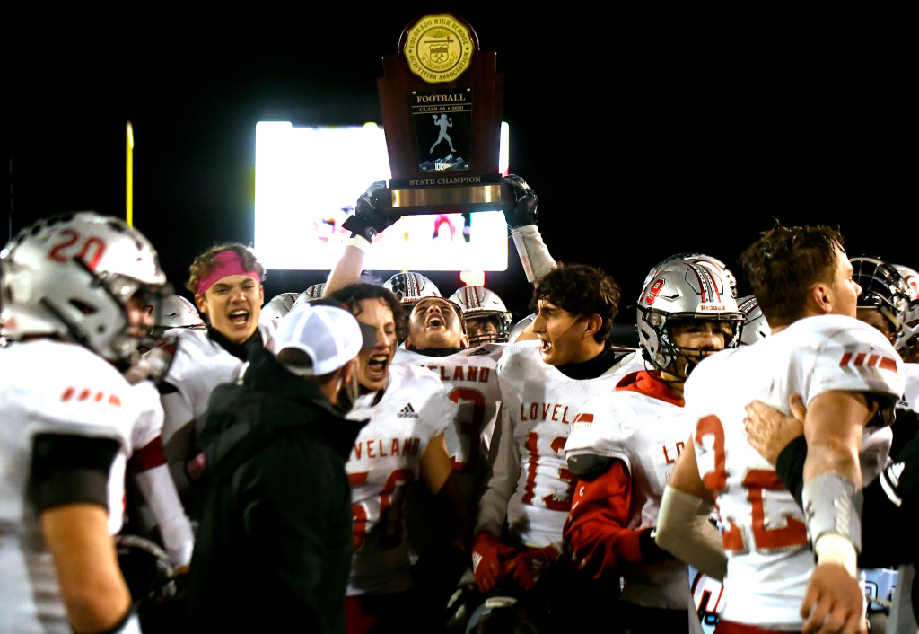 Class 4A state football: Loveland bulldozes Palmer Ridge,
42-6, without throwing a single pass to win championship 1