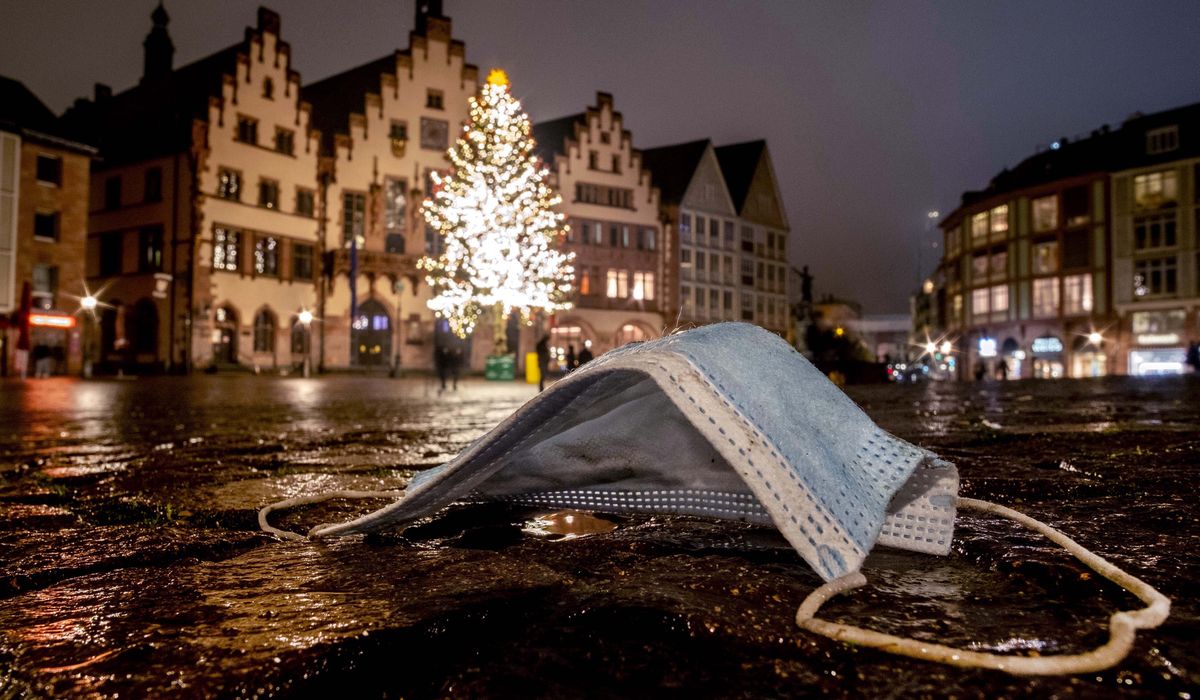 Angela Merkel pleads for coronavirus cooperation after
'lockdown lite' fails 1
