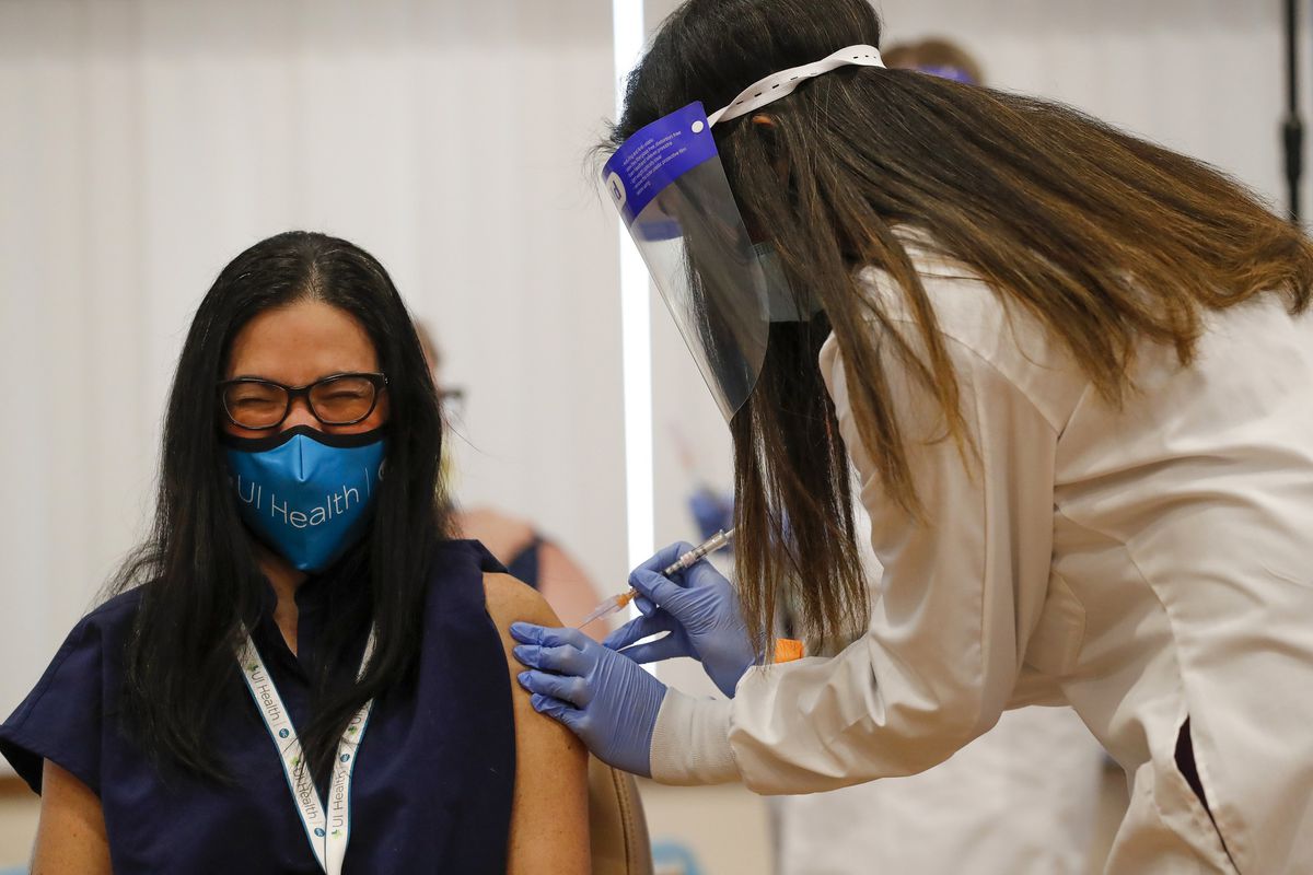 Illinois starts administering COVID-19 vaccine amid optimism
and thoughts of the disease’s victims 1 Illinois starts administering COVID-19 vaccine amid optimism
and thoughts of the disease’s victims 1