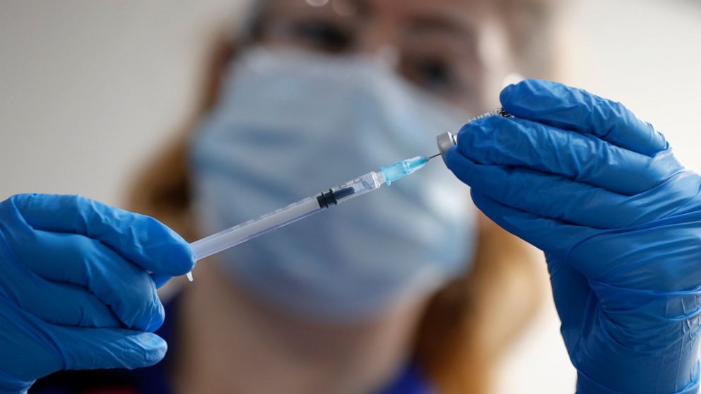 UK investigates possible allergic reactions to COVID-19
shot 1
