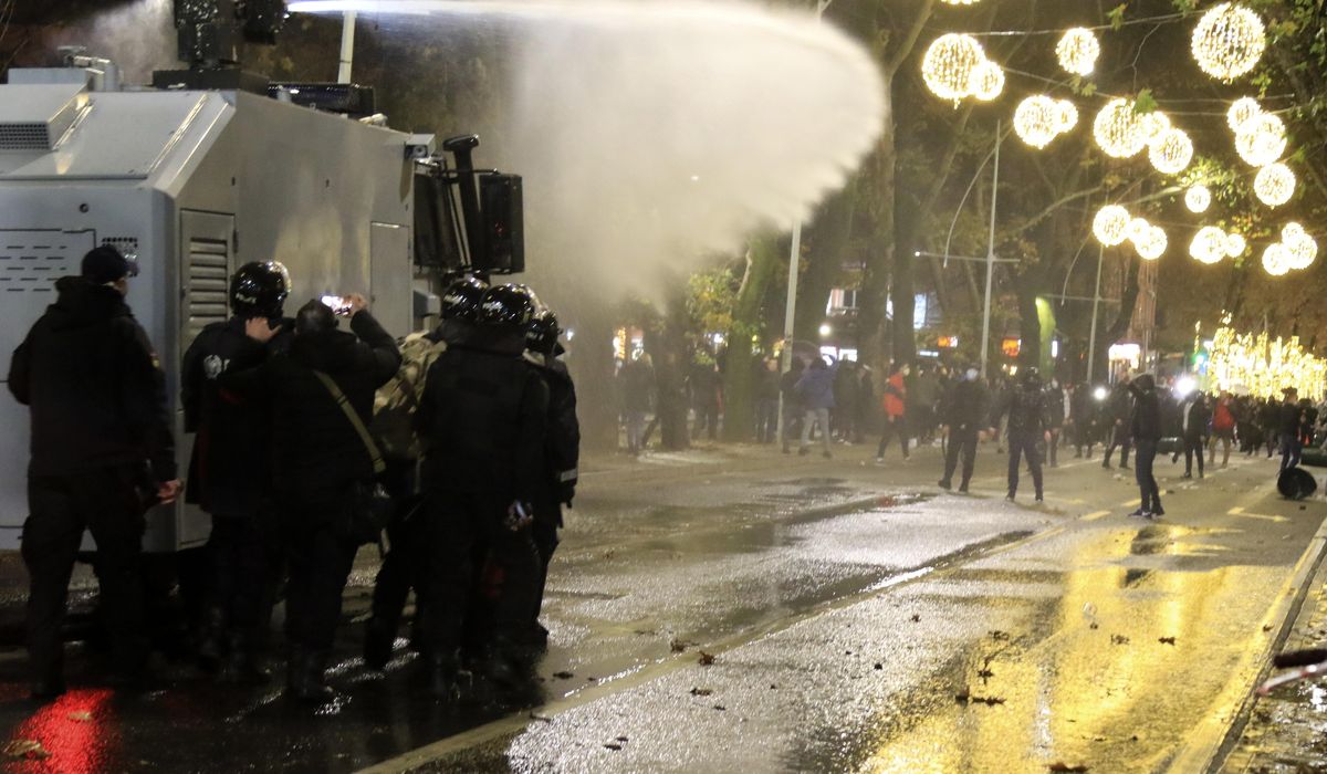 Protests continue in Albania over curfew killing by
police 1