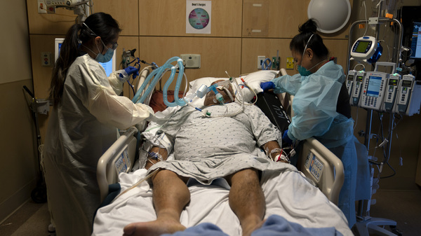 U.S. Surpasses 3,600 Daily Coronavirus Deaths, Breaks Prior
Hospitalization Record 1
