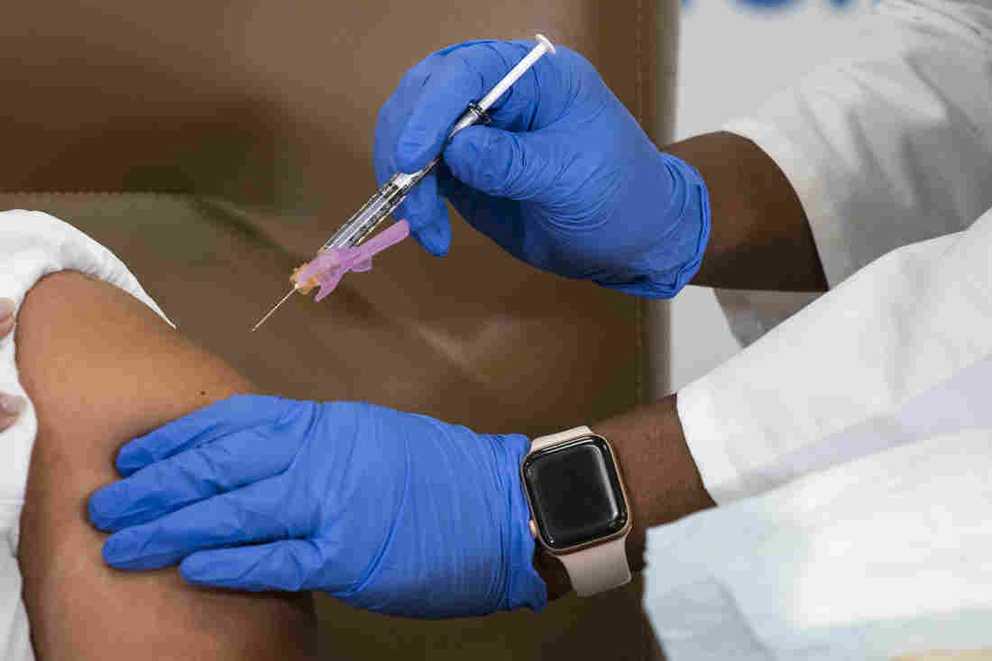 As Hospitals Rollout COVID-19 Vaccines, Health Care Workers
Describe Chaos And Anger 1