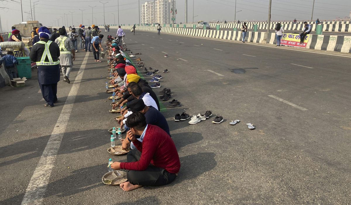 India farmers intensify protest against new laws with
strike 1