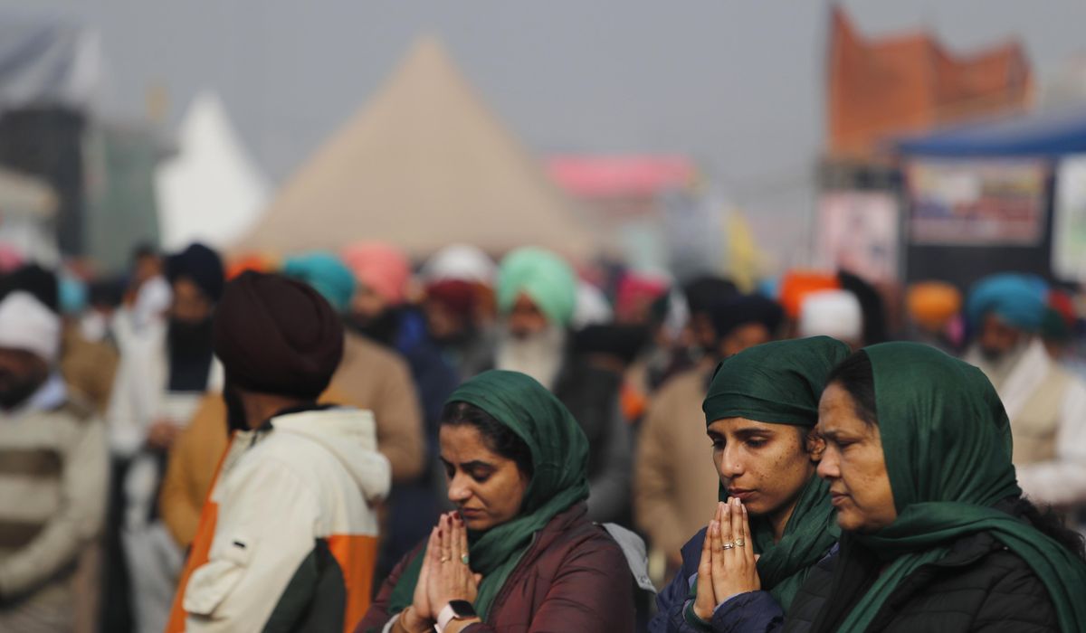 Month on, women hold the fort at India farmer
protests 1