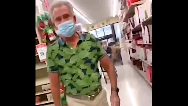 Watch man get vicious, stalk woman over mask 1