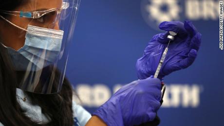 Coronavirus vaccine makes a long, cold journey to rural
America 1