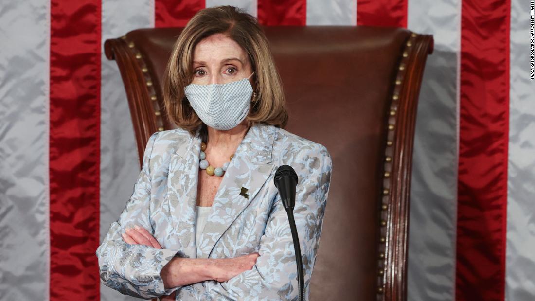 Pelosi tells 2 lawmakers to wear masks after tense
exchange 1