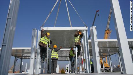 China builds massive Covid-19 quarantine camp for 4,000
people as outbreak continues 1